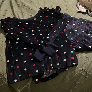 Fleece polka dots pajamas. Navy blue with multicolored polka dots, it's adorable